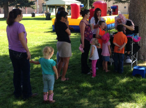 Face painting festival fun Giggle Loopsy Denver area clown