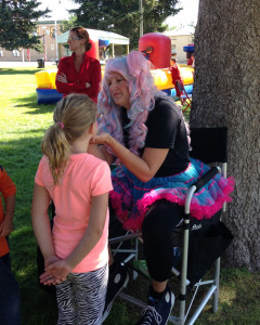 Face painting festival fun Giggle Loopsy Denver area clown